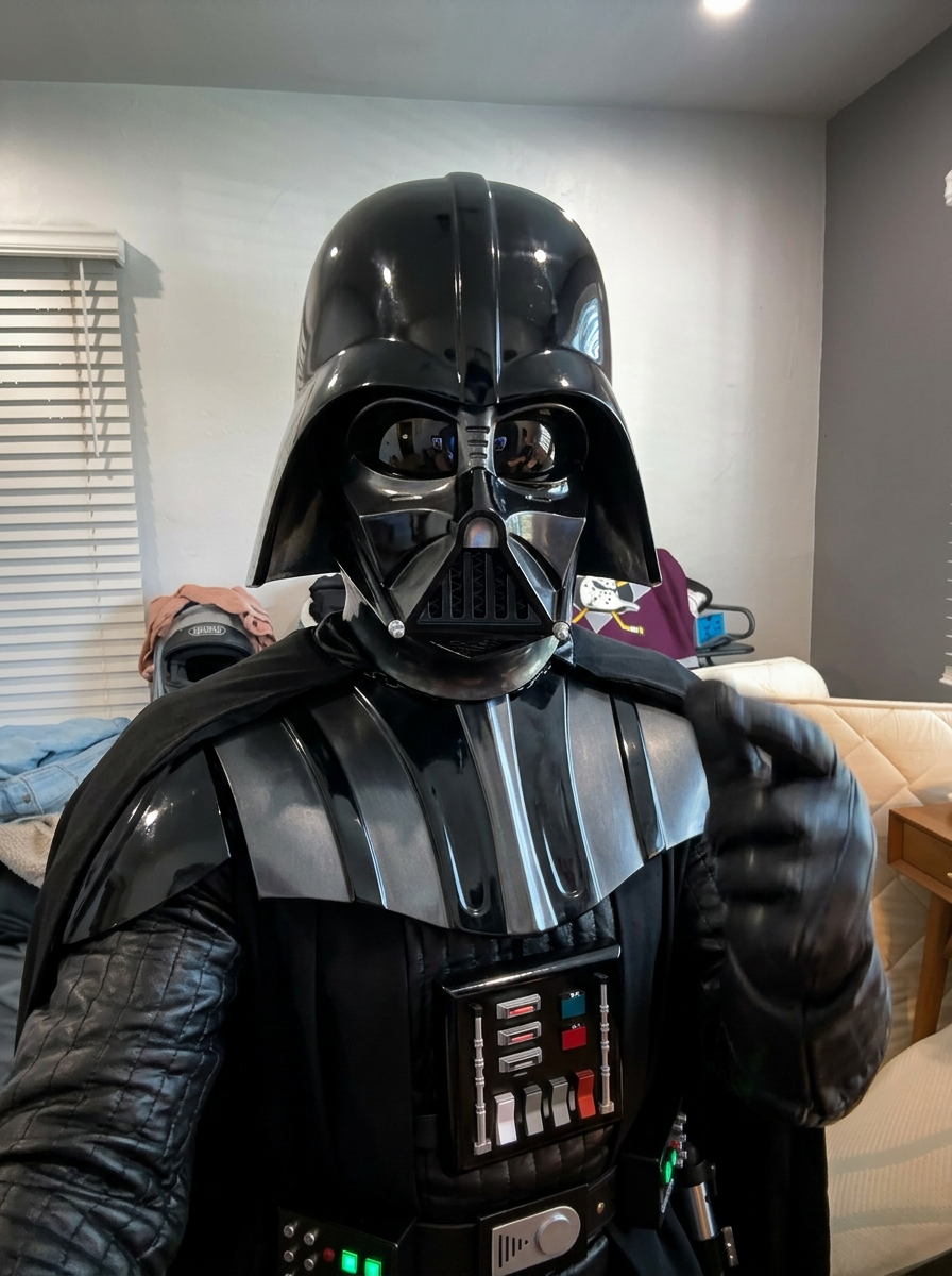 Keep the EXACT same composition, framing, camera angle, body pose, limb positions, and depth of the subject in frame as the input image. Transform the character into: Darth Vader. Replace appearance, costume, skin/fur/material, and facial features to match the new character — but the silhouette, stance, and action must be identical to the input. If the description names a scene or location, transform the background to match it; if no scene is named, keep the original background. The camera angle and subject position in frame must not move. Photorealistic where the new character allows; cinematic detail; no text or watermarks.